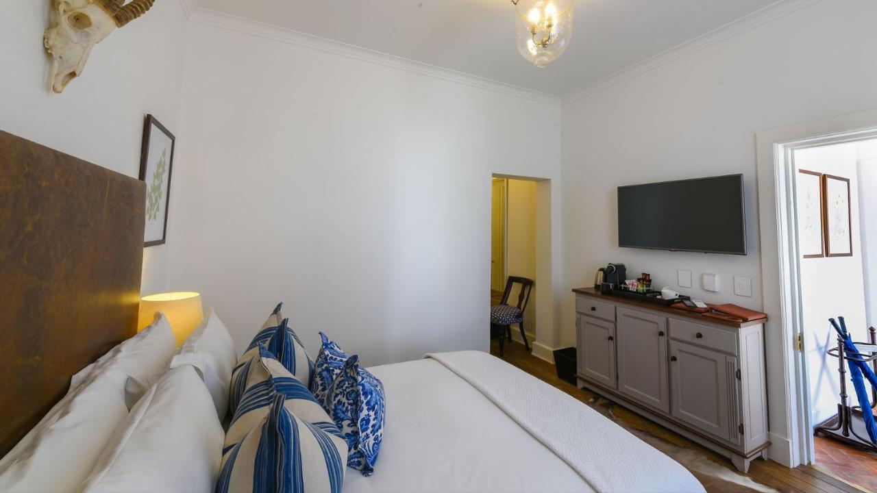 Drostdy Hotel Graaff-Reinet Kültér fotó A room at the hotel
