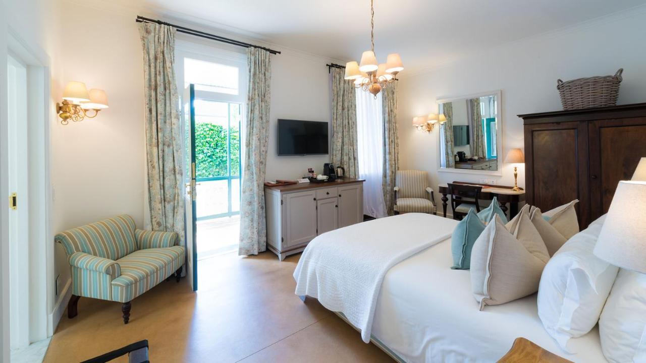 Drostdy Hotel Graaff-Reinet Kültér fotó A room at the Cape Heritage