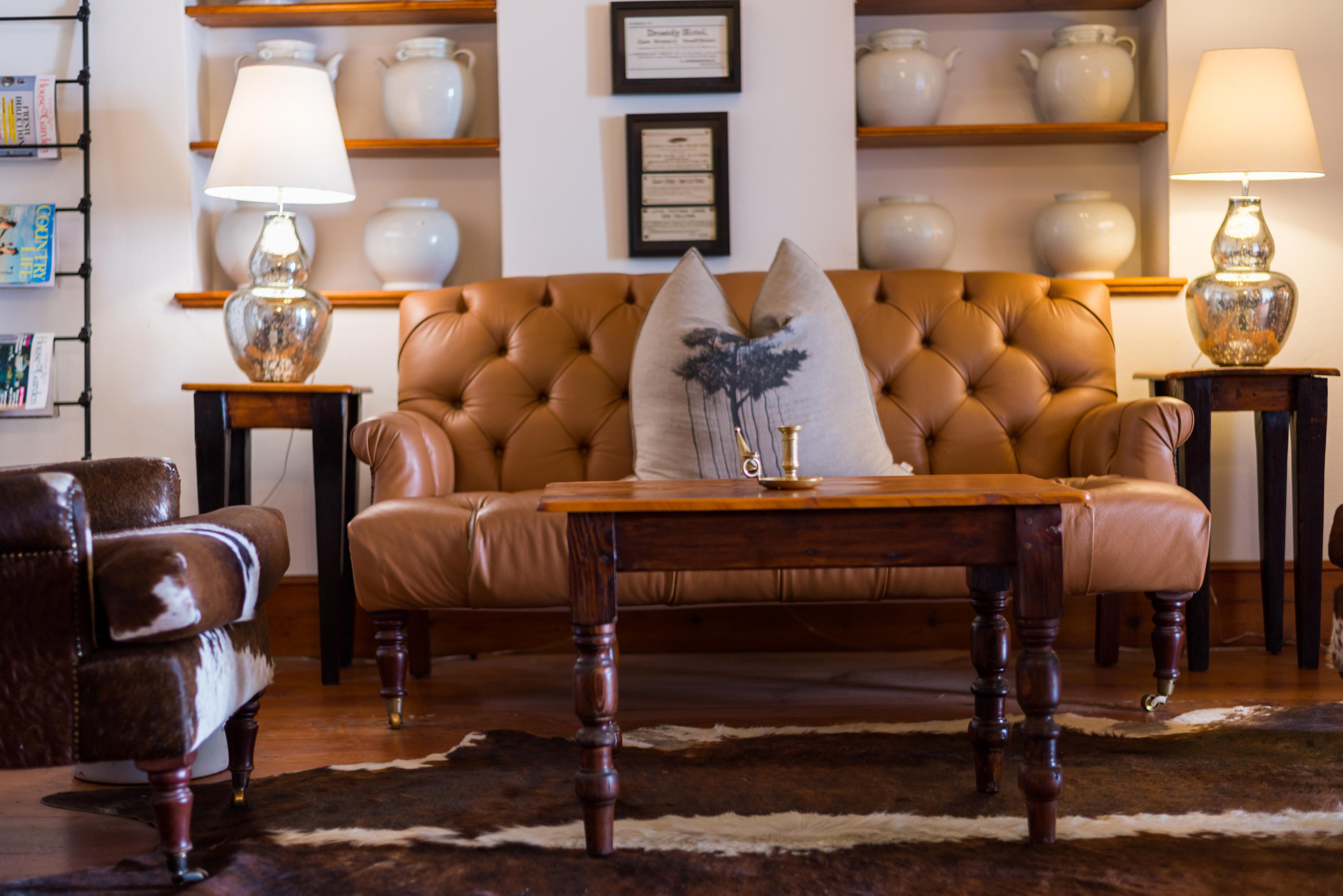 Drostdy Hotel Graaff-Reinet Kültér fotó A leather sofa